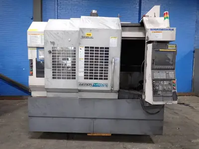 USED 2011 OKUMA CORPORATION GENOS M560V