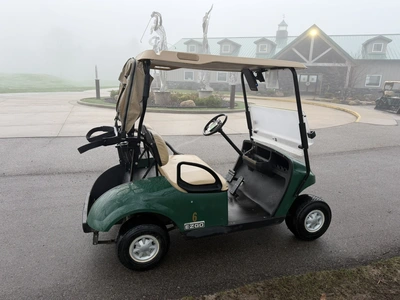 (1) 2015 E-Z-Go golf cart with a Kawasaki gas engine, includes canopy, ball cover, club cover, fold-...