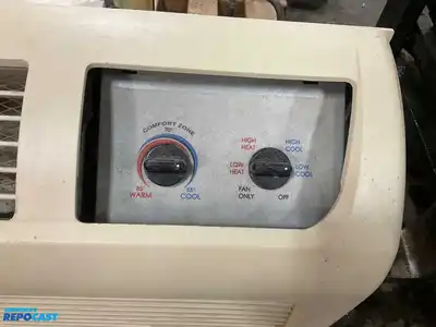 Wall Heater make and model unknown with slight exterior damage