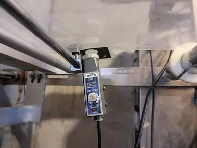 Flow Packer with Bucket Infeed