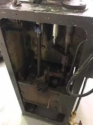 Kalix model KX-60 16-Station Tube filler and sealer
