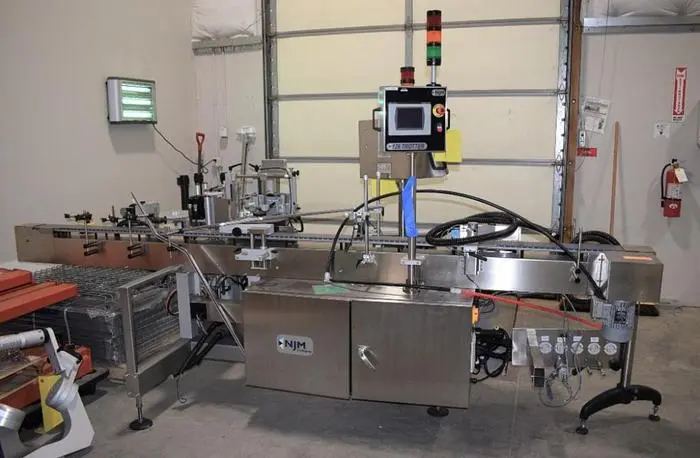 Used 2014 NJM PACKAGING 126 TROTTER  TR126-SO12 Pressure Sensitive Labelers Oregon US | Ager Tank & Equipment Co. #1061575