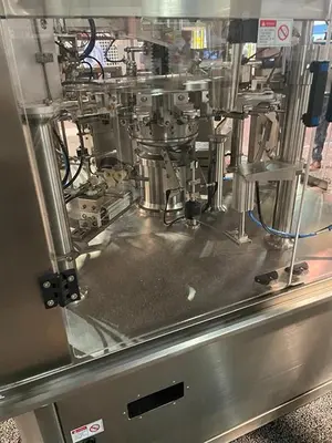 New Genesis Rotary Pre-Made Pouch Machine with 14-Head Scale