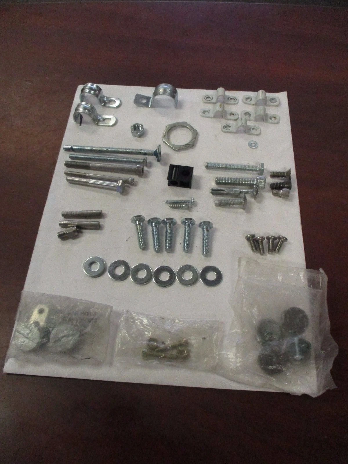 Unused Screws, Nuts&Bolts, Washers, Locknuts, One & Two-hole Straps, & Plugs