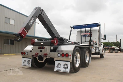 Used 2027 PETERBILT 548 Hooklifts & Roll-Offs Texas US | Roll Off Truck World #1491992