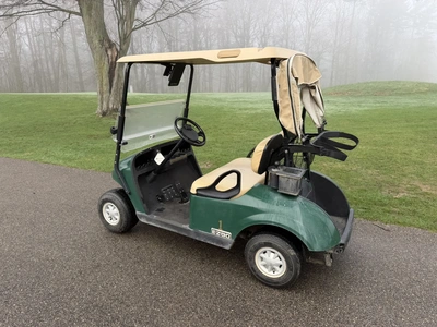(1) 2015 E-Z-Go golf cart with a Kawasaki gas engine, includes canopy, fold-down windshield, and bal...