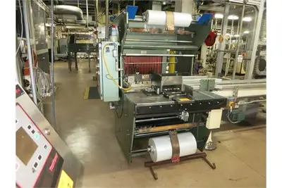 Weldotron 12080 tray wrapper, roller infeed, sealing jaws