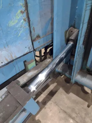 20,000 LBS X 54" X 36" BRANER HYDRAULIC COIL CAR UPENDER WITH POWER FEED CONVEYOR: YOBRO #25238