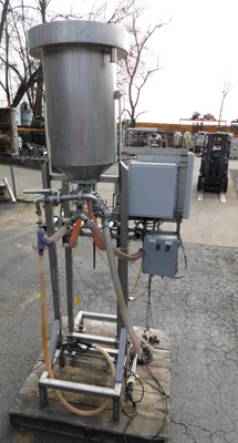 USED FOUR STATION VOLUMETIRIC FILLER FOUR STATION
