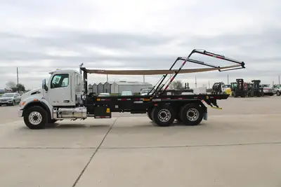 New | in-Stock 2027 PETERBILT 548 Rolloff Trucks Texas US | Roll Off Truck World #1492000