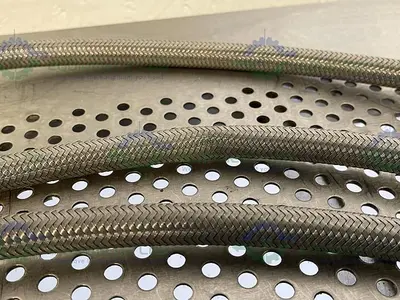 USED 208" STAINLESS STEEL BRAIDED HOSE W/ 1/2" SANITARY FITTINGS
