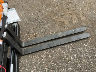 Used WOLVERINE PFA-11-3300G SKID STEER PALLET FORK HYDRAULIC ADJUSTABLE Pallet Forks Michigan US | Miedema Asset Management Group #1468677