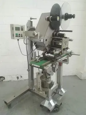 Sato model 8490S Pressure Sensitive labeler