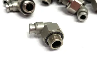 USED SMC METAL MALE ELBOW SWIVEL FITTING 10MM OD TUBE