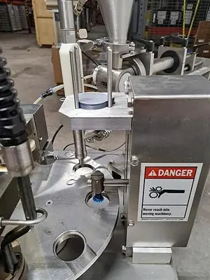 Quality Cup model QC-8 Rotary Cup Filler & Sealer