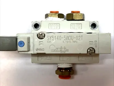 USED SMC SOLENOID VALVE 5-PORT 24VDC 1/4" BASE MOUNT