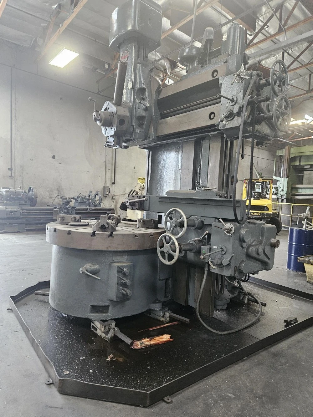 57" Schiess, 60" Swing, 30" under rail, One ram and one side head, 1959