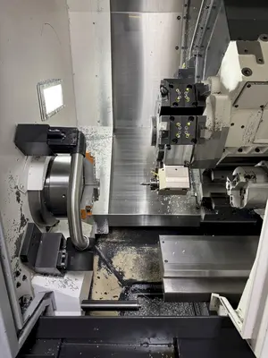 USED 2016 OKUMA GENOS L300MYW