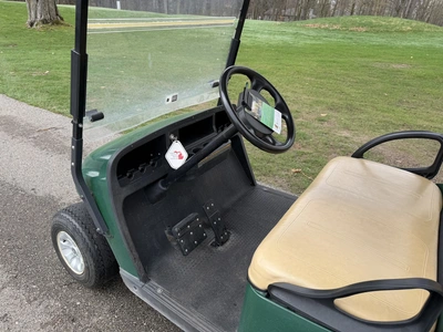 (1) 2015 E-Z-Go golf cart with a Kawasaki gas engine, includes Club canopy and ball washer, fold-dow...