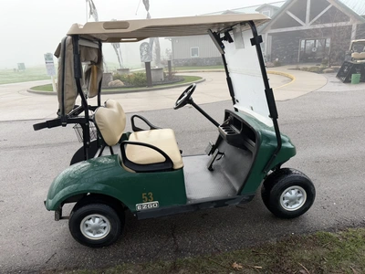 (1) 2017 E-Z-Go golf cart with a Kawasaki gas engine, model 625111G01,includes canopy, ball cover, c...