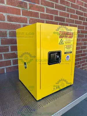 USED EAGLE 1903X 4 GALLON FLAMMABLE LIQUID STORAGE CABINET W/ SOFT CLOSE DOOR, KEY