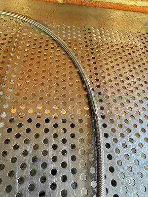 Used SWAGELOK SS-4CP4-10 CHECK VALVE W/ 42" STAINLESS STEEL BRAIDED HOSE 3/4" TO 1/2" Hoses California US | Equipment Lab #1427415