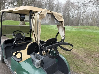 (1) 2015 E-Z-Go golf cart with a Kawasaki gas engine, includes Club canopy, ball washer, fold-down w...