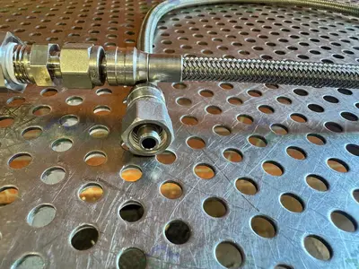 Used SWAGELOK SS-4CP4-10 CHECK VALVE W/ 31" STAINLESS STEEL BRAIDED HOSE 3/4" TO 1/2" Hoses California US | Equipment Lab #1427417