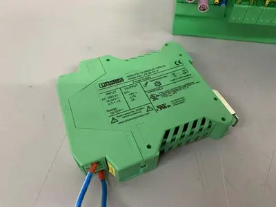 USED PHOENIX CONTACT TERMINAL BLOCK W/ IBS IL 21 BK-T/U-PAC ON RAILS