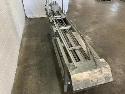 Pneumatic Press on Chain Conveyor