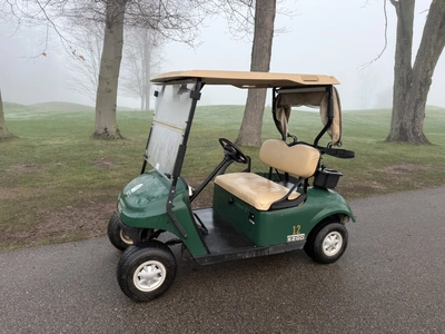 (1) 2015 E-Z-Go golf cart with a Kawasaki gas engine, includes canopy, ball cover, club cover, fold-...