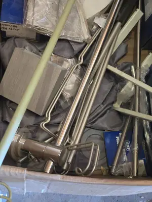 Plumbing and Home Improvement Items including Delta Faucet, Curtain Rods, and Shower Curtain - Conditions Untested