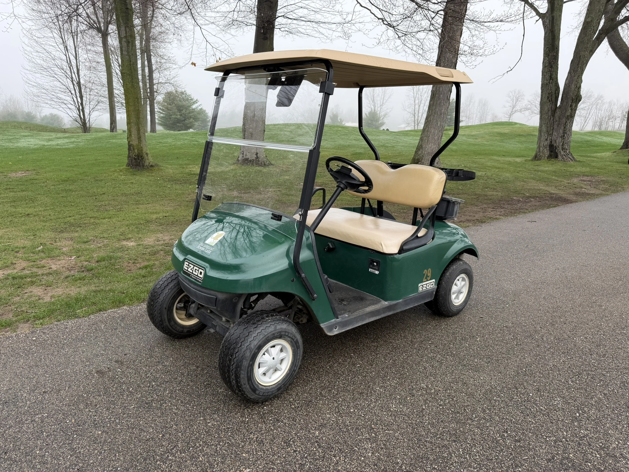 (1) 2015 E-Z-Go golf cart with a Kawasaki gas engine, includes Club Clear club and ball washer, does...