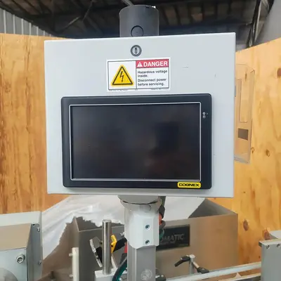 LSI Front and Back Labeler with integrated hold down