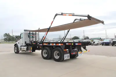 New | in-Stock 2027 PETERBILT 548 Rolloff Trucks Texas US | Roll Off Truck World #1492000