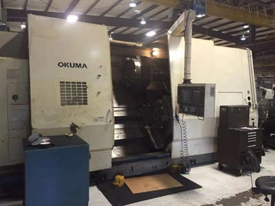 USED 1995 OKUMA IMPACT