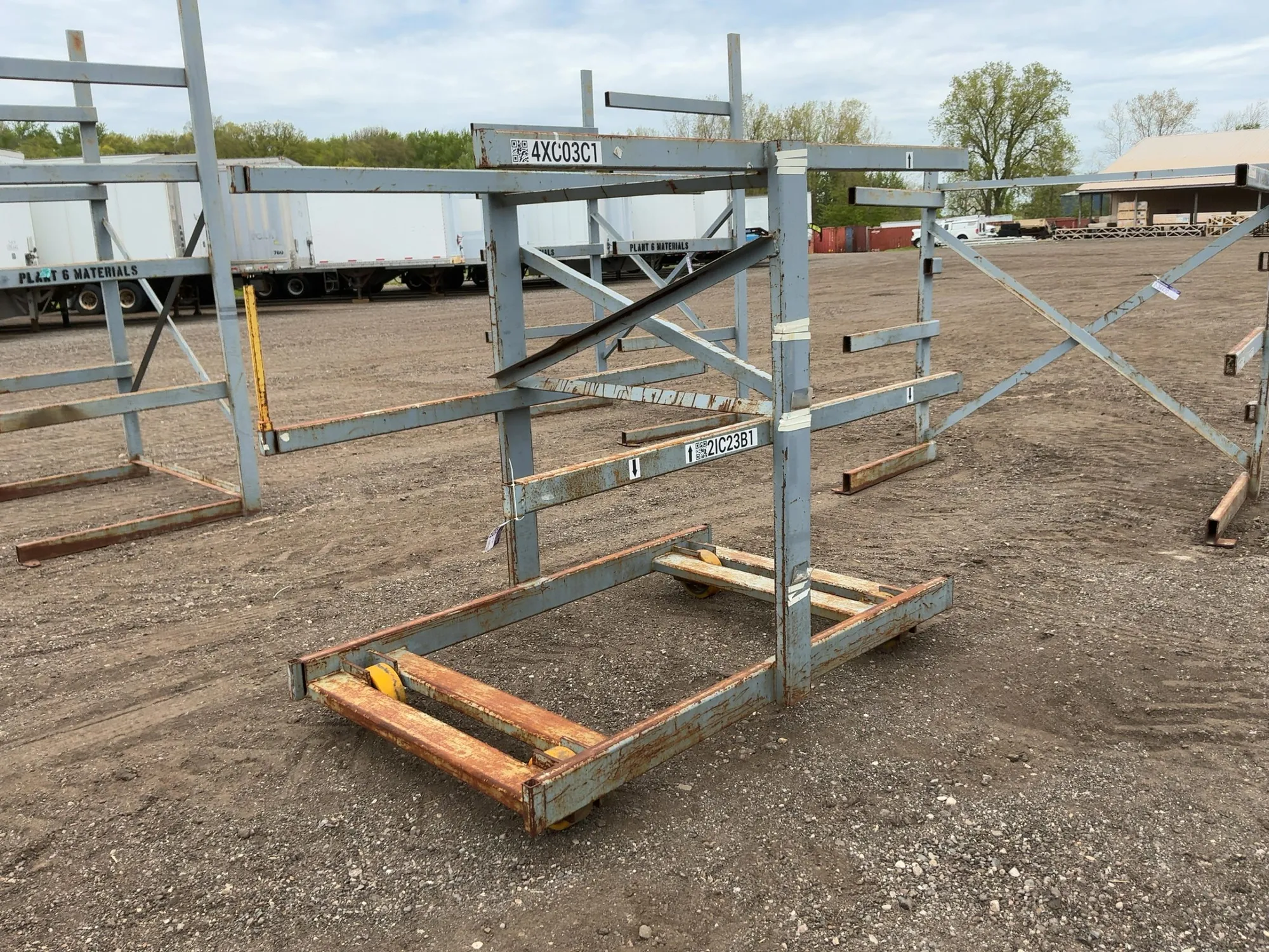 Metal Two Sided Cantilever Rack, on wheels so it can roll sideways, welded together, arms stick out ...