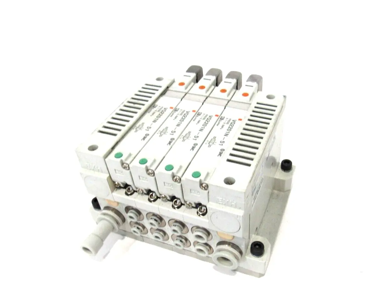 USED SMC VV5Q21-04C4FU0-NS MANIFOLD W/ VQ2201N-51 VV5Q2104C4FU0NS
