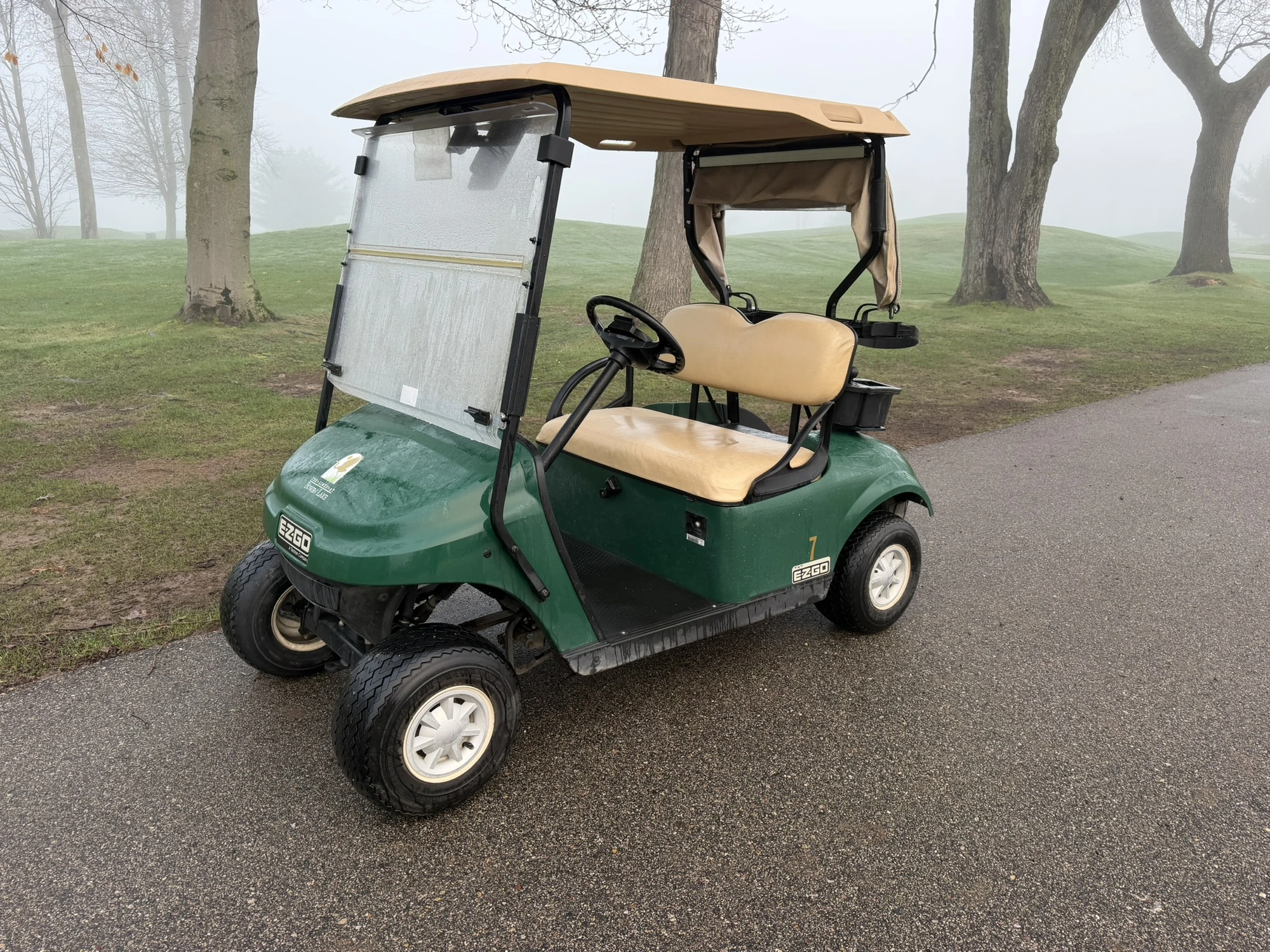 (1) 2015 E-Z-Go golf cart with a Kawasaki gas engine, includes canopy, ball cover, club cover, fold-...