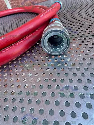 USED SWAGELOK PUSH ON 124" FLAME RESISTANT HOSE 3/4” 300PSIG W/ QUICK RELEASE FITTING