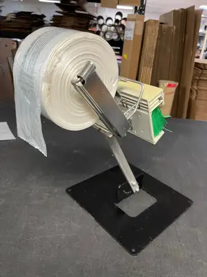 Used Crown Poly Used Crown Poly Pull N Pak Produce Bag Dispenser with Twist Ease Tie Dispenser and Stand Bag Machine Accessories Illinois US | Falcon Restaurant Supply #1375806