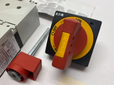 USED EATON MOLDED CASE CIRCUIT BREAKER EMER. SWITCH ASSEMBLY KIT, RED HANDLE