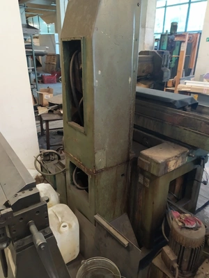 ZMM Surface Grinder, in good working condition, visible under power
