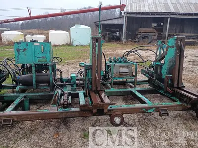 USED HELLE 3-HEAD BLOCK SAWMILL WITH VERTICAL EDGER