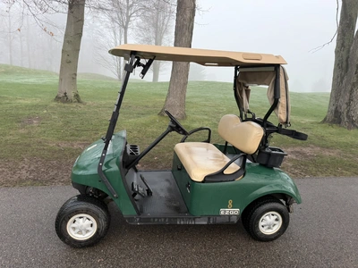 (1) 2015 E-Z-Go golf cart with a Kawasaki gas engine, includes canopy, ball cover, club cover, fold-...