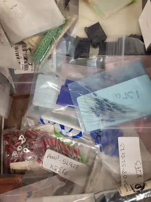 Box of Assorted Electronic Connectors, Resistors, and Hardware Components
