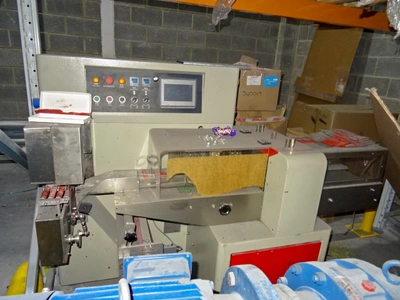 Samfull S/S extruder with horizontal form fill and sealer