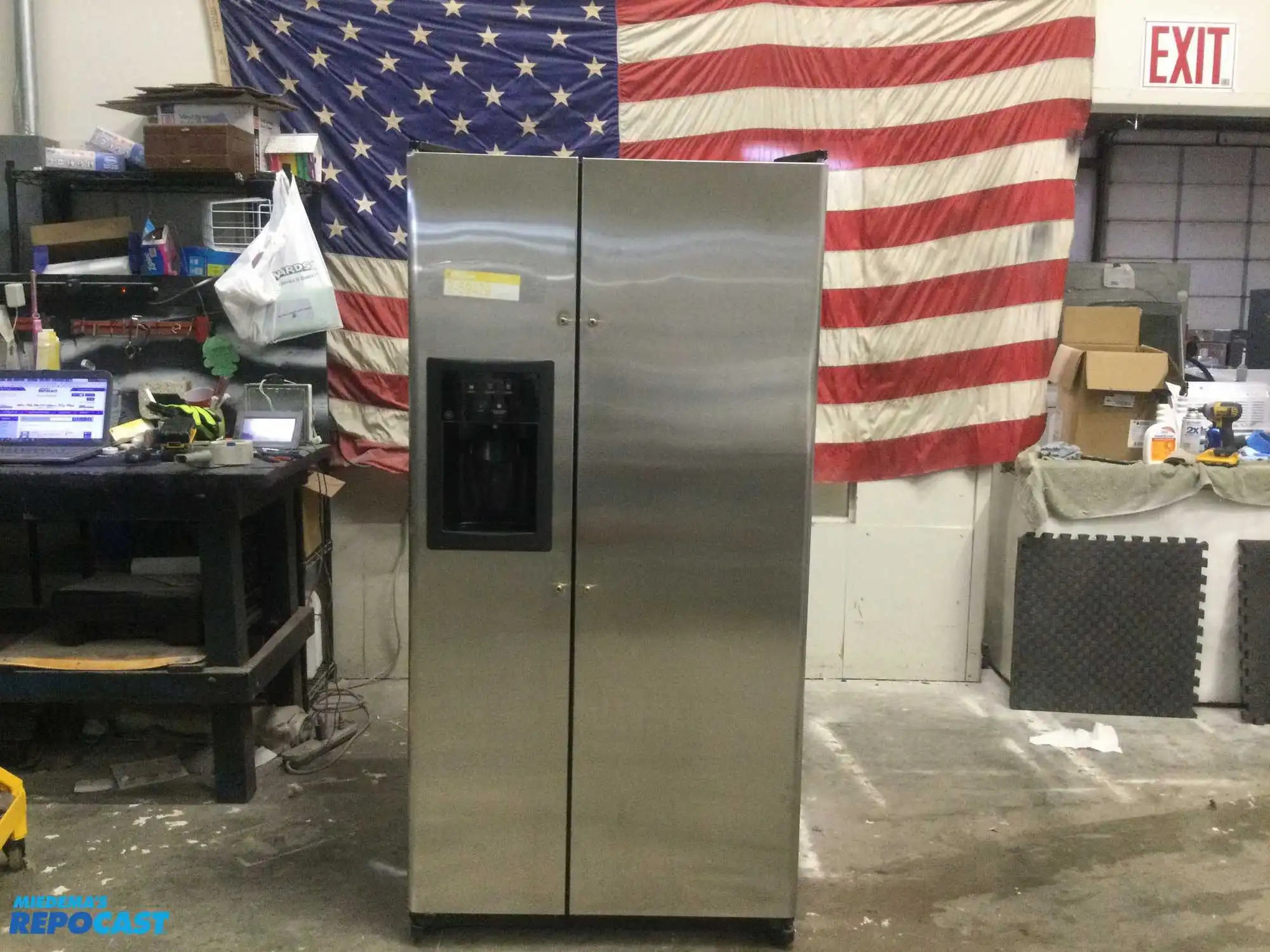 USED GE STAINLESS STEEL AND BLACK SIDE X SIDE REFRIGERATOR HEAVY DUTY ENERGY STAR
