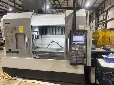 2020 OKUMA Genos M660-V Vertical Machining Centers | Tight Tolerance Machinery (2)