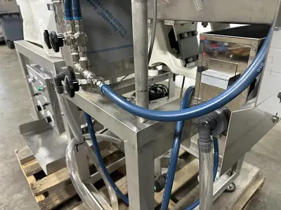 Vibratory Conveyor with Spray Nozzles